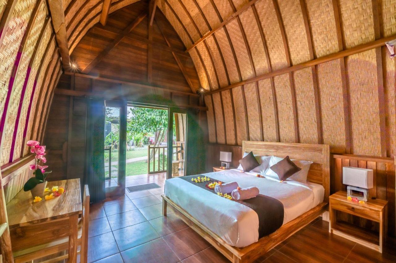 Wooden Puri Guesthouse Uluwatu Exterior foto