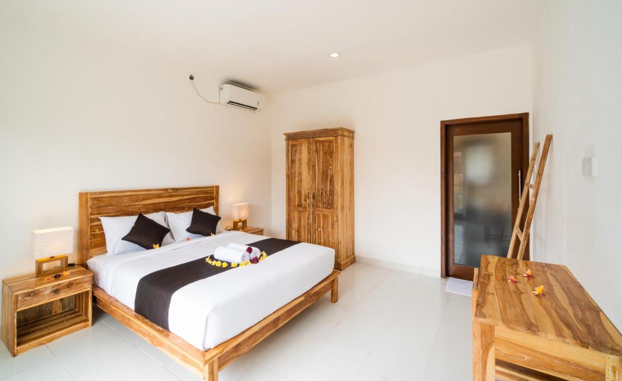 Wooden Puri Guesthouse Uluwatu Exterior foto